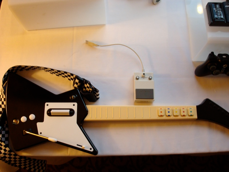 Illustration for article titled Nyko Gaming Goodness: Guitar Hero / Rock Band Guitar, Wireless Nunchuck, PS3 Rumble and More